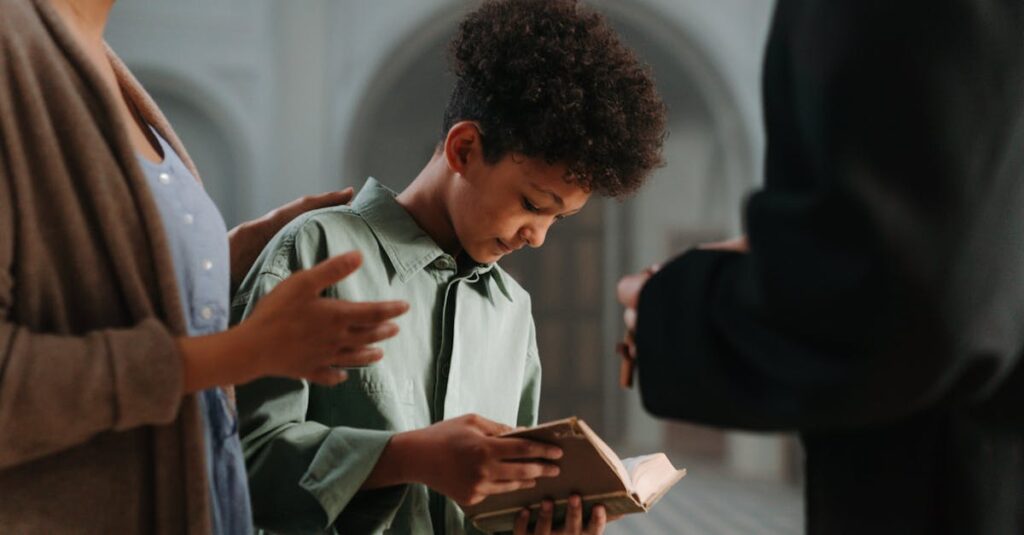 A young boy reads a religious book with guidance from adults in an indoor church setting.